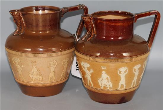 A pair of Doulton Egyptian jugs